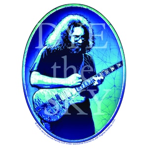 May include: A blue and green oval-shaped illustration of Jerry Garcia playing a guitar. The text "the" is visible in the image. The text "©2018 Jerry Garcia Family LLC under exclusive license to JGF Rights Holding, LLC." is visible at the bottom of the image.