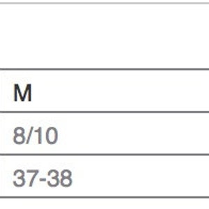 May include: Size chart for clothing with measurements in inches and US sizes. XS is size 2, S is 4/6, M is 8/10, L is 12/14, XL is 16/18, and 2XL is 20/22. Bust measurements are in inches.