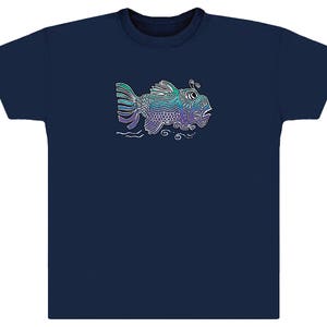 May include: A navy blue t-shirt with a white outline of a stylized fish with purple, blue, and green accents.