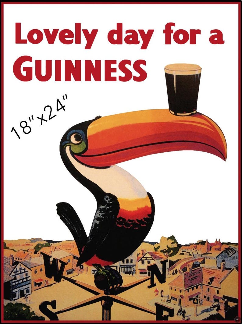 Może przedstawiać: Plakat Guinness w stylu vintage przedstawiający tukana z kuflem Guinnessa na dziobie. Plakat ma wymiary 46 cm x 61 cm i zawiera napis "Lovely day for a Guinness". Tukan jest umieszczony na tle miasta.