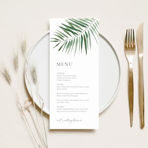 May include: A wedding menu with a tropical theme. The menu features a watercolor illustration of a palm leaf in green tones. The menu includes starter, entree, and dessert options. The text reads: "MENU, STARTER, Rarker, Bettermas Squ and Rose Piarnuts with an Iraliun Visaignese, ENTREE, Fillet of Beef with Truffled Perates, Goren Beans and Jus, Bocast of Chicken served with Mashroom Risetto and Fresh Asparagas, Filles of Salmosioms FreePeu and Garlic Aleli, DESSERT, French Vanilla Wedding Cake served with Bantrescosch cecream and Fresh Berries, Heflundtagethomed."