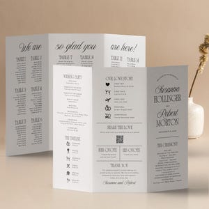 May include: A tri-fold wedding program with elegant black script. The program includes the names of the wedding party, timeline, and a section titled "Our Love Story." The names Susanna Hollinger and Robert Morton are featured.