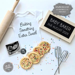 May include: A white onesie with the text "Baking Something Extra Sweet!" on it. A framed chalkboard sign reads "Baby Baker Due August 202X". There are sprinkles, cookies, a rolling pin, and a whisk in the image.
