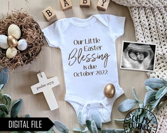 May include: A white onesie with the text "Our Little Easter Blessing is due October 2022" on it. There is a wooden cross with the text "psalm 127:3" on it, a nest with eggs, a wooden block that says "BABY", and an ultrasound image.