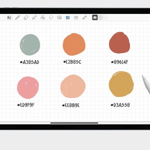 May include: A digital tablet screen displaying six different colored circles with their corresponding hex color codes. The circles are drawn in a hand-drawn style. The tablet is on a white surface with a white stylus next to it.