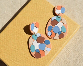 Chunky eye-catching earrings in abstract pattern Bold terracotta statement earrings in colorful details