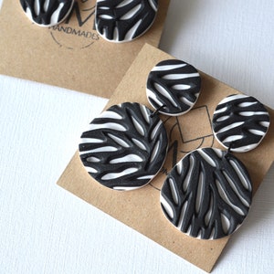 Carved earrings in black and white Bold textured artistic statement earrings Handmade polymer clay jewelry