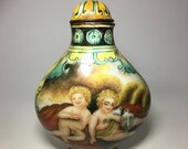 Mid Qing dynasty Qianlong mark Chinese Jingtailan cloisonné 4 angels and sea wave motif snuff bottle height 6.5cm 清中期珐琅彩小天使江波纹鼻烟壶 高6.5cm