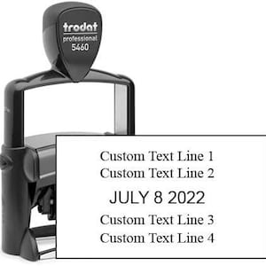 May include: A black self-inking stamp with a rectangular imprint area. The imprint reads "Custom Text Line 1", "Custom Text Line 2", "JULY 8 2022", "Custom Text Line 3", and "Custom Text Line 4".