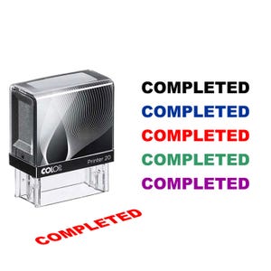 May include: A black and clear "COLOR Printer 20" stamp with the word "COMPLETED" in red, black, blue, red, green, and purple. The stamp is shown with a red stamped impression of the word "COMPLETED".
