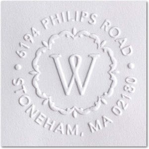 May include: White round return address stamp with the text "6194 Phillips Road Stoneham, MA 02180" and a decorative border with the letter "W" in the center.