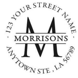 May include: A round, black and white self-inking rubber stamp with the text "123 YOUR STREET NAME - MORRISON'S - ANYTOWN STE, LA 56789" and a stylized letter "M" in the center.
