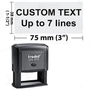 May include: Black Trodat printy 4926 stamp with the text "CUSTOM TEXT" and "Up to 7 lines". The stamp is 3 inches wide and 1.5 inches high. Ideal for custom text.