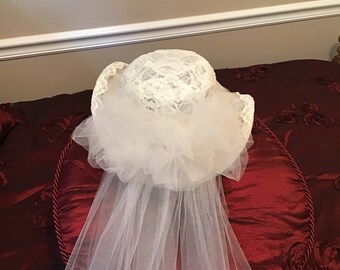 wedding dress and hat