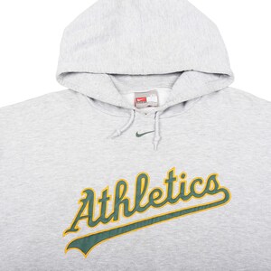 vintage nike mlb , nike sportswear hoodie , athletics baseball hoodie , nike collector hoodie , rare mlb hoodie , 90s baseball fashion , y2k streetwear hoodie , vintage sportswear , nike heritage hoodie , mlb fashion hoodie , oakland a’s gear , nike big logo hoodie , retro sportswear hoodie , vintage team hoodie , nike pullover hoodie , mlb winter hoodie , nike old school hoodie , vintage nike sweatshirt , mlb gift for him , baseball fan hoodie , oakland a’s merch , nike casual hoodie