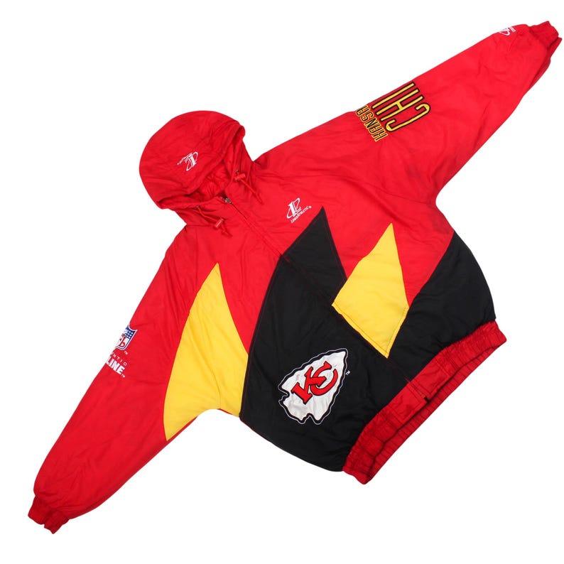 Kansas city chiefs nfl, Logo athletic jacket, Vintage chiefs puffer, NFL pro line jacket, 90s sports streetwear, KC chiefs windbreaker, Heavyweight puffer coat, Retro nfl outerwear, Red color block jacket, Embroidered nfl coat, Arrowhead stadium gear, Spell out sleeve jacket, Vintage hip hop jacket, Official nfl merchandise, Rare vintage puffer