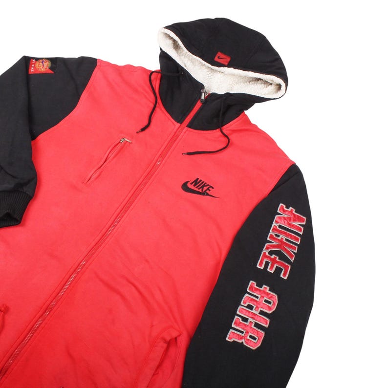 nike air 90s jacket , red nike winter hoodie , vintage nike sherpa coat , retro nike air hoodie , nike back logo jacket , 90s nike street style , nike big logo hoodie , vintage nike collectors item , classic nike air jacket , y2k nike winter fit , nike fleece hoodie vintage , oversized nike 90s jacket , retro athletic nike hoodie , nike old tag vintage , vintage swoosh jacket , nike winter fashion , rare nike air outerwear , streetwear nike jacket , 90s nike fleece coat , nike statement jacket