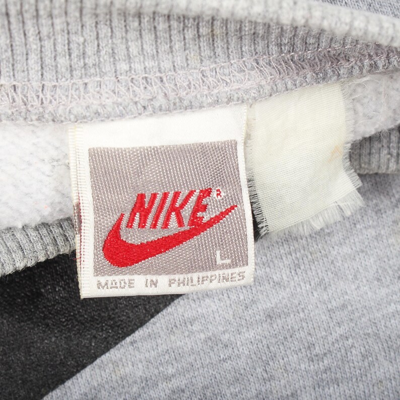 nike air vintage, vintage nike sweatshirt, nike air crewneck vintage, old school nike clothing, classic nike air, vintage swoosh logo, retro nike apparel, minimalist streetwear nike, vintage athletic wear, nike heritage clothing, vintage nike pullover, casual streetwear nike, nike sweatshirt 90s, sports vintage nike, unisex nike sweatshirt, vintage sports crewneck, classic nike logo, throwback nike sweatshirt, usa nike vintage, everyday nike sweatshirt
