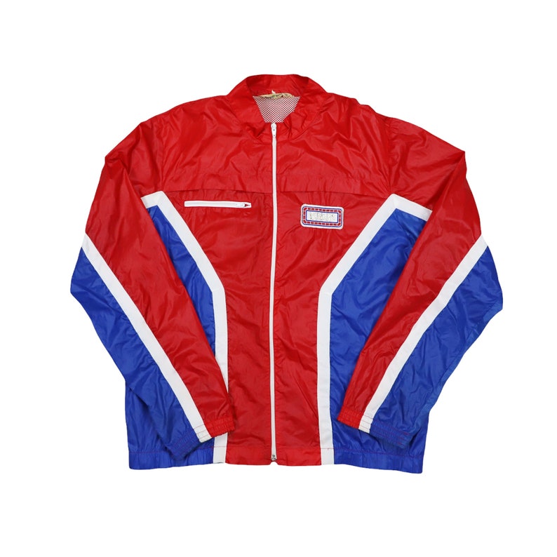 Vintage Yamaha-inspired red, blue, and white colorblock windbreaker jacket with zip-up front and sporty design , Yamaha streetwear , 90s colorblock style , lightweight biker jacket , breathable Yamaha jacket , old school racing gear , y2k Yamaha windbreaker