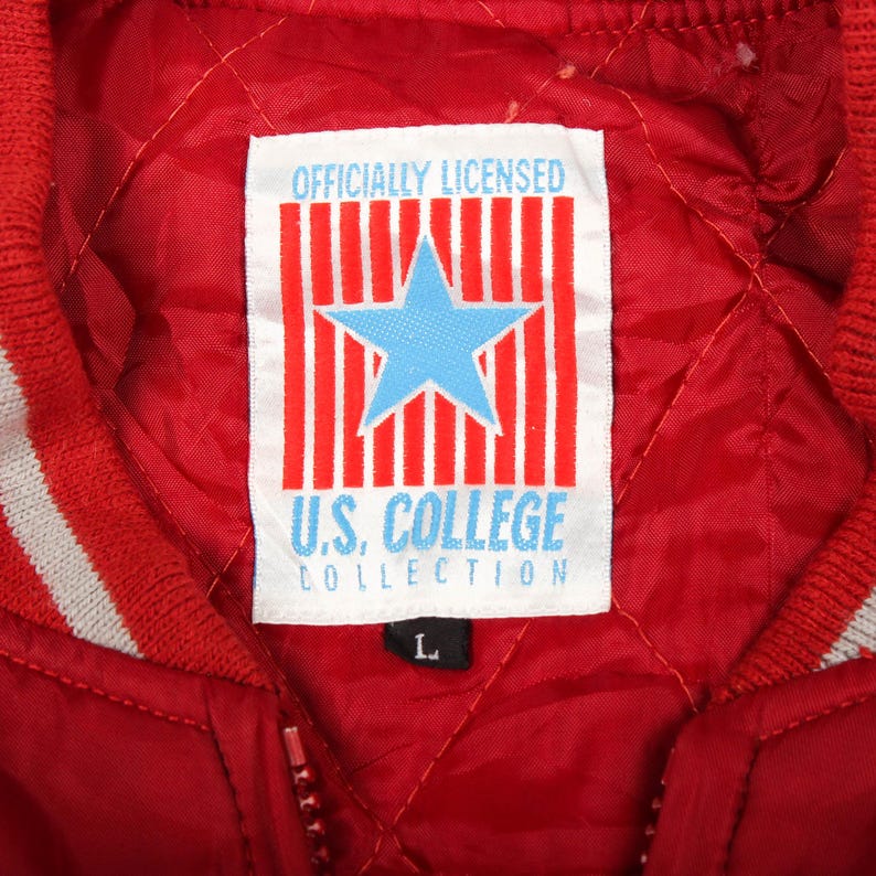 vintage unc jacket, 90s duke windbreaker, vintage clemson bomber, retro south carolina coat, vintage nc state hoodie, 90s charlotte hornets jacket, vintage champion reverse weave, retro lee sport jacket, vintage starter satin bomber, 90s chalk line jacket, ncaa vintage shirt, vintage apex one jacket, retro college tailgating, 90s hip hop sports fashion, streetwear grail jackets, old money aesthetic clothing, minimal university jumper, thrift store sportswear, vintage clothing usa,