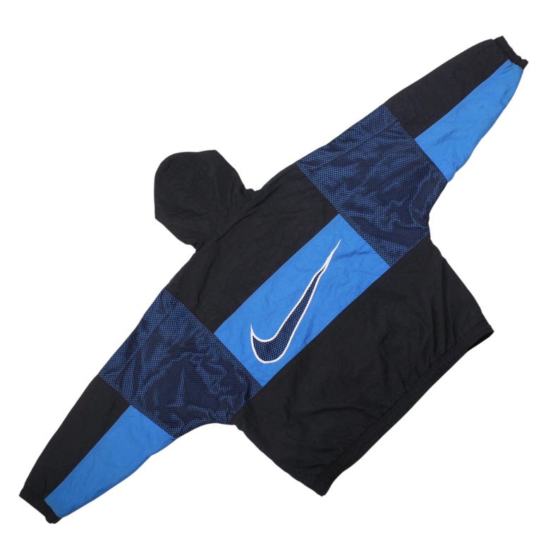 Vintage Nike Air black and blue hooded puffer jacket with large swoosh logo on back, 1990s streetwear style