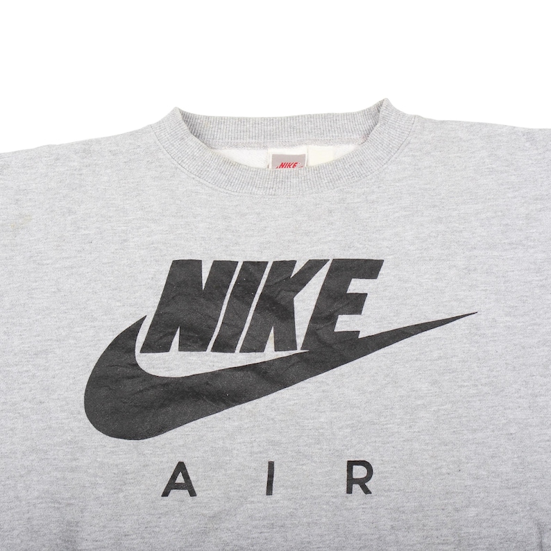 vintage swoosh sweatshirt, retro sportswear nike, nike sweatshirt men, nike sweatshirt women, oversized nike crewneck, vintage gym sweatshirt, nike casual wear, sportswear vintage usa, vintage nike pullover, classic sports sweatshirt, nike throwback sweatshirt, vintage nike essentials, athletic streetwear nike, nike air crewneck, old school sportswear, vintage swoosh crewneck, nike lifestyle sweatshirt, vintage nike apparel, casual vintage nike , heritage nike sweatshirt