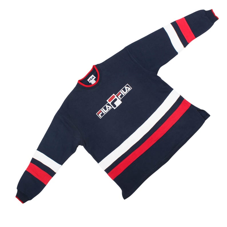 vintage Fila spellout sweatshirt, 90s retro athletic crewneck, embroidered Fila logo pullover, navy blue sportswear sweater, block stripe vintage sweatshirt, classic blockcore aesthetic clothing, old school hip hop pullover, horizontal stripe sports top, heavy cotton fleece crewneck, contrast ringer neck sweatshirt, 1990s casual terrace fashion, vintage unbranded style sportswear, oversized boxy vintage sweater, white and red stripe jacket, cozy autumn winter streetwear