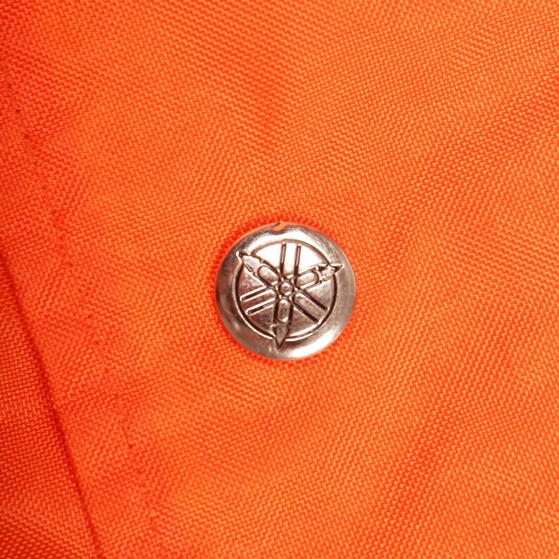 Vintage motorsport jacket , Snow gear jacket , Retro Yamaha coat , Orange vintage jacket , Yamaha collector piece , Vintage ski wear , Winter sports jacket , Classic Yamaha jacket , 80s motorsport clothing , Snowmobile racing jacket , Vintage racing apparel , Yamaha racing vintage , Vintage 80s jacket , Yamaha snow gear , Retro Yamaha outerwear , Snowmobile fashion , Vintage Yamaha gear , Winter racing coat , Retro Yamaha merchandise , Vintage snowmobile coat , Yamaha vintage fashion