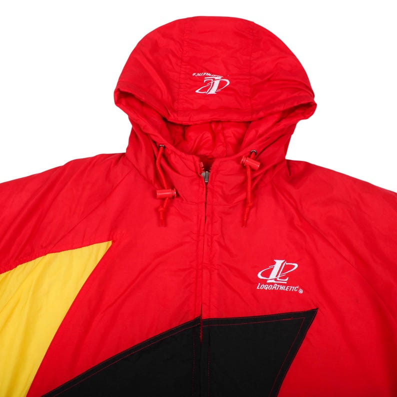 90s puffer jacket, vintage streetwear jacket, hip hop winter coat, oversized puffer men, color block windbreaker, vintage logo athletic, retro starter jacket style, 1990s streetwear, heavy winter outerwear, spell out jacket, embroidered sports coat, cozy winter puffer, vintage windbreaker jacket, nineties hip hop style, streetwear grail, hypebeast vintage