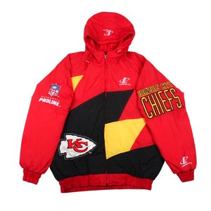 Front view of men's vintage Kansas City Chiefs hooded winter jacket with red, black, and yellow color-block design.