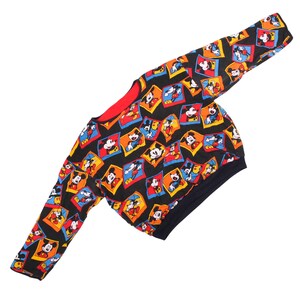 vintage disney jacket, vintage 90 jacket, y2k windbreaker, hip hop jacket, mickey mouse sweater, vintage crewneck, reversible sweatshirt, all over print disney, aop clothing, big character patch, red disney jumper, retro cartoon apparel, disneyland vintage, walt disney world gear, 90s hip hop fashion, streetwear outerwear, vintage movie merch, oversized sweatshirt, thrifted sweater, old school streetwear, mens vintage sweater, rare disney clothes, vintage sports coat, hypebeast vintage,