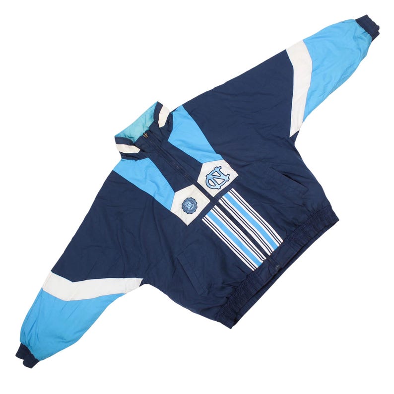 unc jacket , tar heels jacket , north carolina jacket , ncaa jacket , college jacket , vintage college jacket , unc tar heels , mens windbreaker , college streetwear , sports jacket , blue jacket men , retro jacket , ncaa vintage , college team jacket , sportswear jacket , vintage clothing men , mens streetwear , college outfit men , ncaa fan gear , unc apparel , tar heels clothing , vintage sportswear , street style jacket , y2k jacket , mens casual jacket , athletic jacket men ,college fashion
