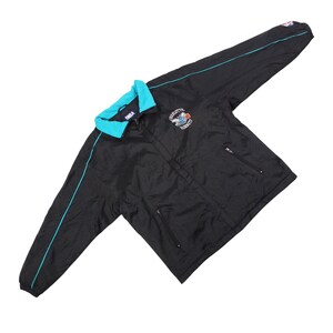vintage charlotte hornets jacket mens , 90s nba windbreaker black teal , retro charlotte hornets zip up coat , vintage nba streetwear xl jacket , charlotte hornets embroidered logo coat , lightweight nylon windbreaker retro , unisex nba vintage outerwear jacket , black teal retro sports jacket hornets , rare charlotte hornets vintage apparel , 90s nba team jacket collectors piece , charlotte hornets retro fan gear , oversized vintage nba jackets , mens xl 90s windbreaker