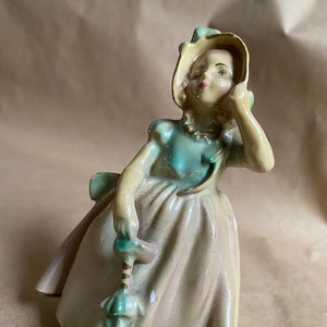 Vintage Lady with Bonnet and Parasol Figurine Pastel