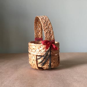Small Round Basket With Complex Woven Strips