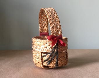 Small Round Basket With Complex Woven Strips