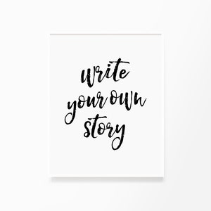 May include: A white framed print with black calligraphy that reads "write your own story".