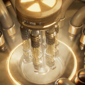Op de afbeelding: Een mechanisch apparaat met een centrale cirkelvormige naaf met uitstralende metalen armen. Aan deze armen hangen vier verticale, cilindrische glazen flesjes met een gloeiende amberkleurige vloeistof, gevat in donkere, getextureerde metalen behuizingen.