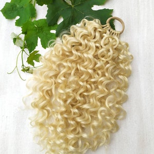 Blond Curly Ponytail Extension: Wavy Synthetic Hairpiece on Elastic Band