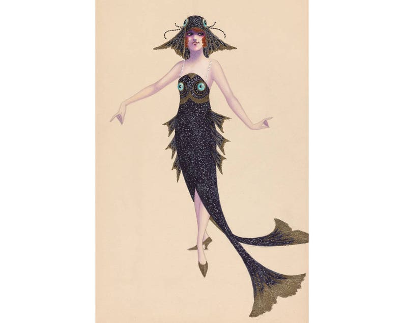 May include: A woman in a black fish-shaped dress with a gold and black fish head hat. The dress has a long tail and the hat has two large blue eyes.