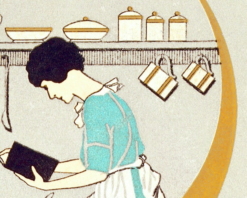 May include: A woman in a turquoise dress and white apron is reading a black cookbook in a kitchen. The kitchen has a shelf with white bowls and jars.