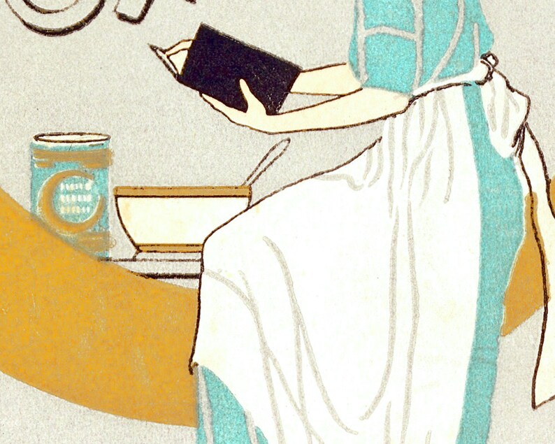 May include: A woman in a turquoise and white dress is reading a book while sitting at a table. A bowl and a can of "Cream of Wheat" are on the table.