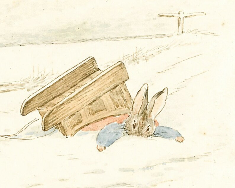 May include: A brown wooden sled tipped over with a brown rabbit wearing a blue jacket and red pants lying underneath.