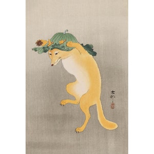 May include: A traditional Japanese woodblock print depicting a fox wearing a gourd on its head. The fox is yellow with a white chest and is standing on its hind legs. The gourd is green with yellow flowers and is resting on the fox's head. The background is a light gray.