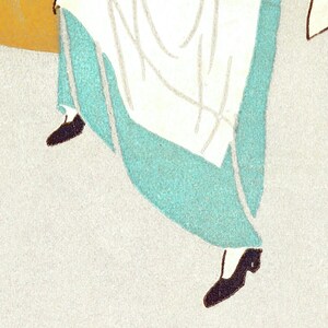 May include: A woman's skirt with a white apron and a turquoise blue underskirt. The skirt is worn with black shoes.