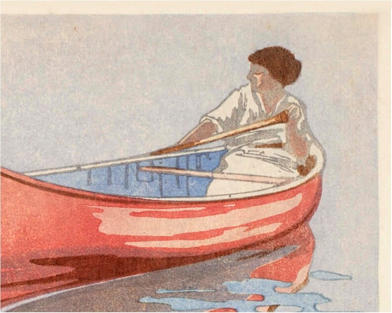 May include: A woman in a white shirt rows a red canoe on a body of water. The canoe has a blue interior and the woman is holding a wooden paddle.