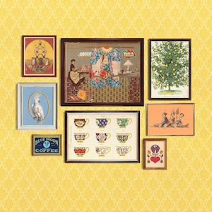May include: A gallery wall arrangement featuring eight framed prints on a yellow patterned wallpaper. The collection includes a circus scene, a botanical lemon tree, a cockatoo, a Blue Moon Coffee sign, teacup illustrations, and figures.