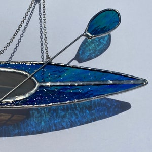 Kayak #20 Stained glass suncatcher hanging from silver steel chain