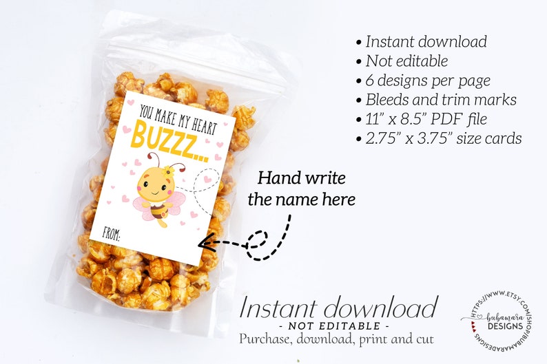 May include: A clear plastic bag filled with popcorn, with a card that says "You make my heart buzz..." and a cartoon bee. The card is designed for a Valentine's Day gift. The card measures 2.75" x 3.75".