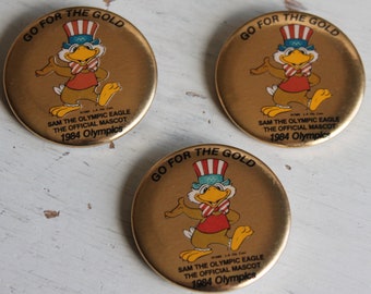 Go For The Gold Sam The Olympic Eagle Mascot Pinback Button Pin L.A. Juegos Olímpicos de 1984